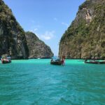 Phi Phi Islands, Krabi Province, Thailand, vacation, beach, tropical getaway, pristine beaches, crystal-clear waters, recreational activities, serene ambiance